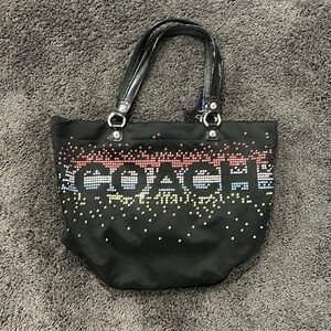 Medium sized coach bag